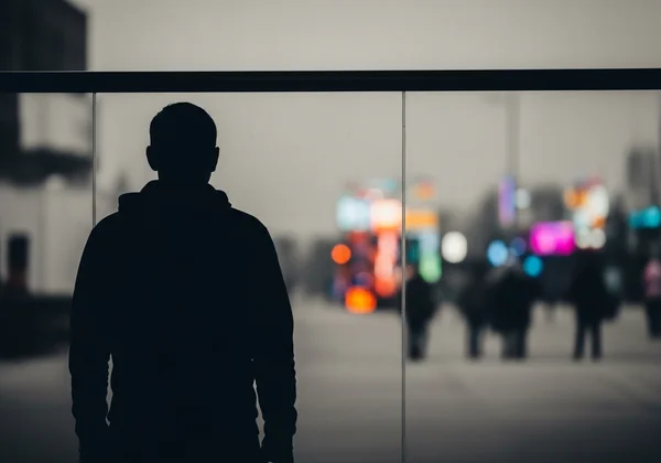 Person looking through a blurry, desaturated world